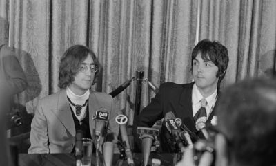 Musicians John Lennon (left) and Paul McCartney of English beat group the Beatles hold a press conference at the Americana Hotel in New York City to announce their new venture, Apple Corps, 14th May 1968. (Photo by Don Paulsen/Michael Ochs Archives/Getty Images)