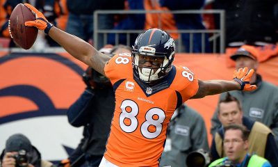 DENVER, CO - JANUARY 11:  Demaryius Thomas #88 of the Denver Broncos celebrates a first quarter touchdown with  Virgil Green #85  during a 2015 AFC Divisional Playoff game against the Indianapolis Colts  at Sports Authority Field at Mile High on January 11, 2015 in Denver, Colorado.  (Photo by Harry How/Getty Images)